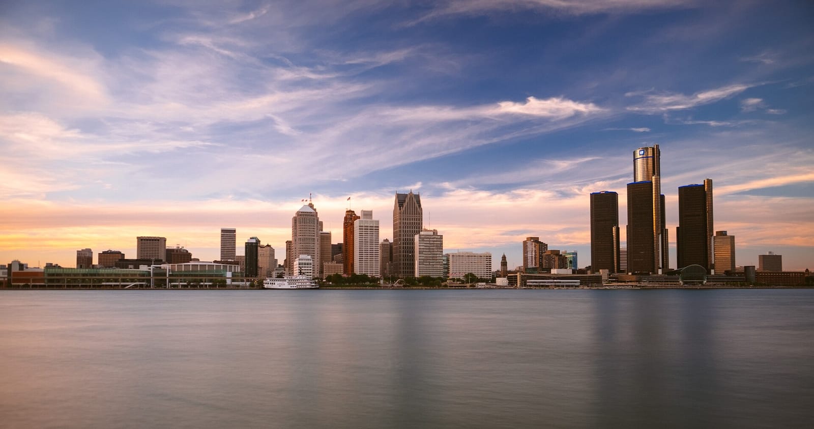 The Detroit skyline across the river at sunset, Michigan The Detroit skyline across the river at sunset, Michigan