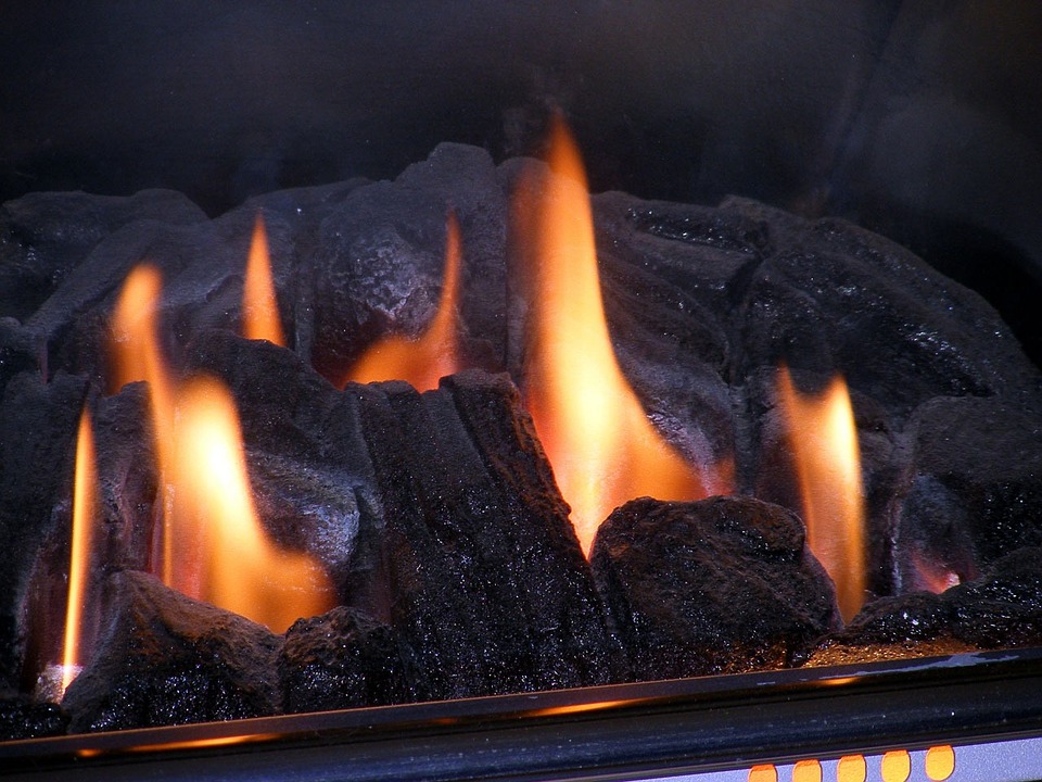 Flames burning in a gas fireplace Flames burning in a gas fireplace