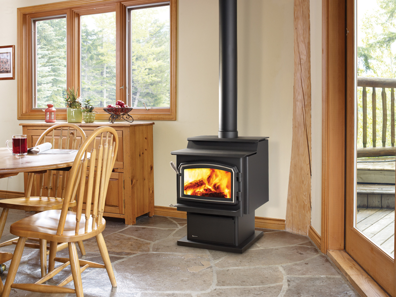 A Classic free standing wood stove in a dining room
