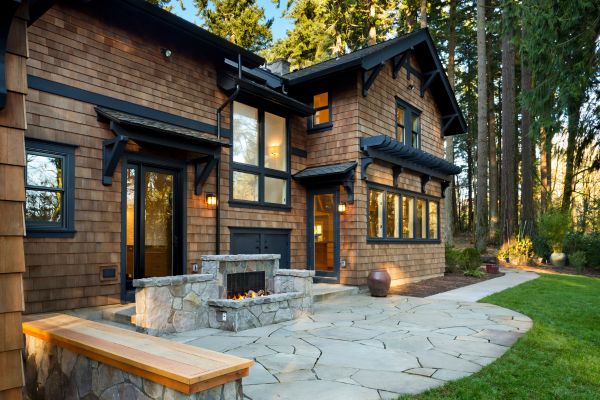 Outdoor masonry fireplace built into a patio