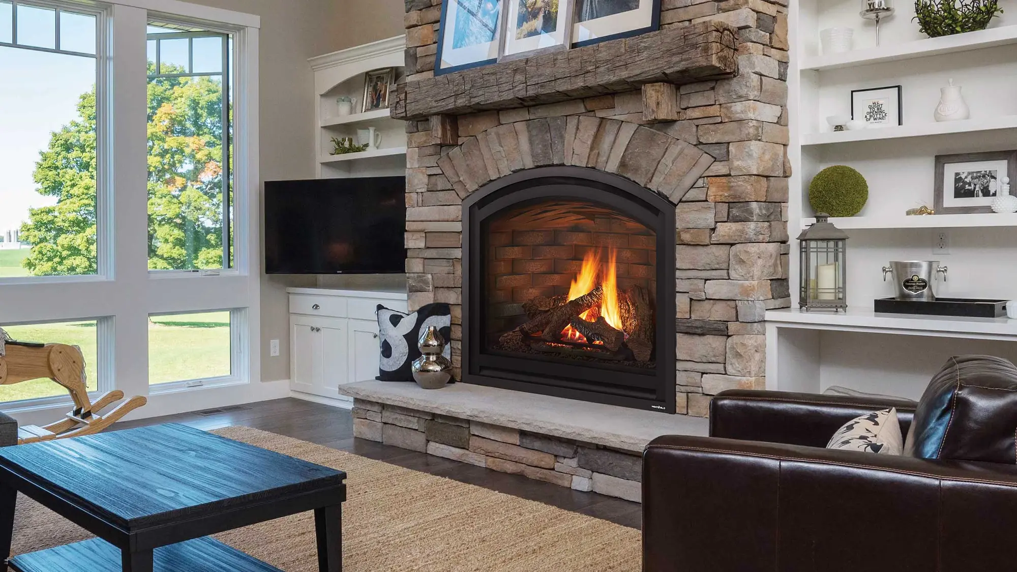 Gas fireplace insert in a stone surround Gas fireplace insert in a stone surround